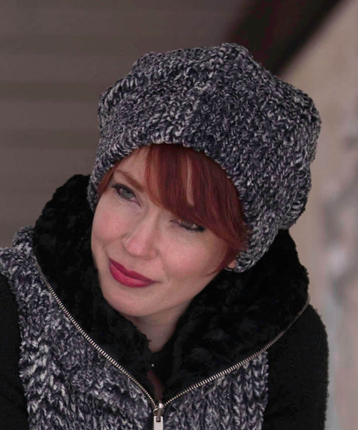 Model in Cozy Cable Faux Fur Lined with Cuddly Fur in Black by Pandemonium Millinery