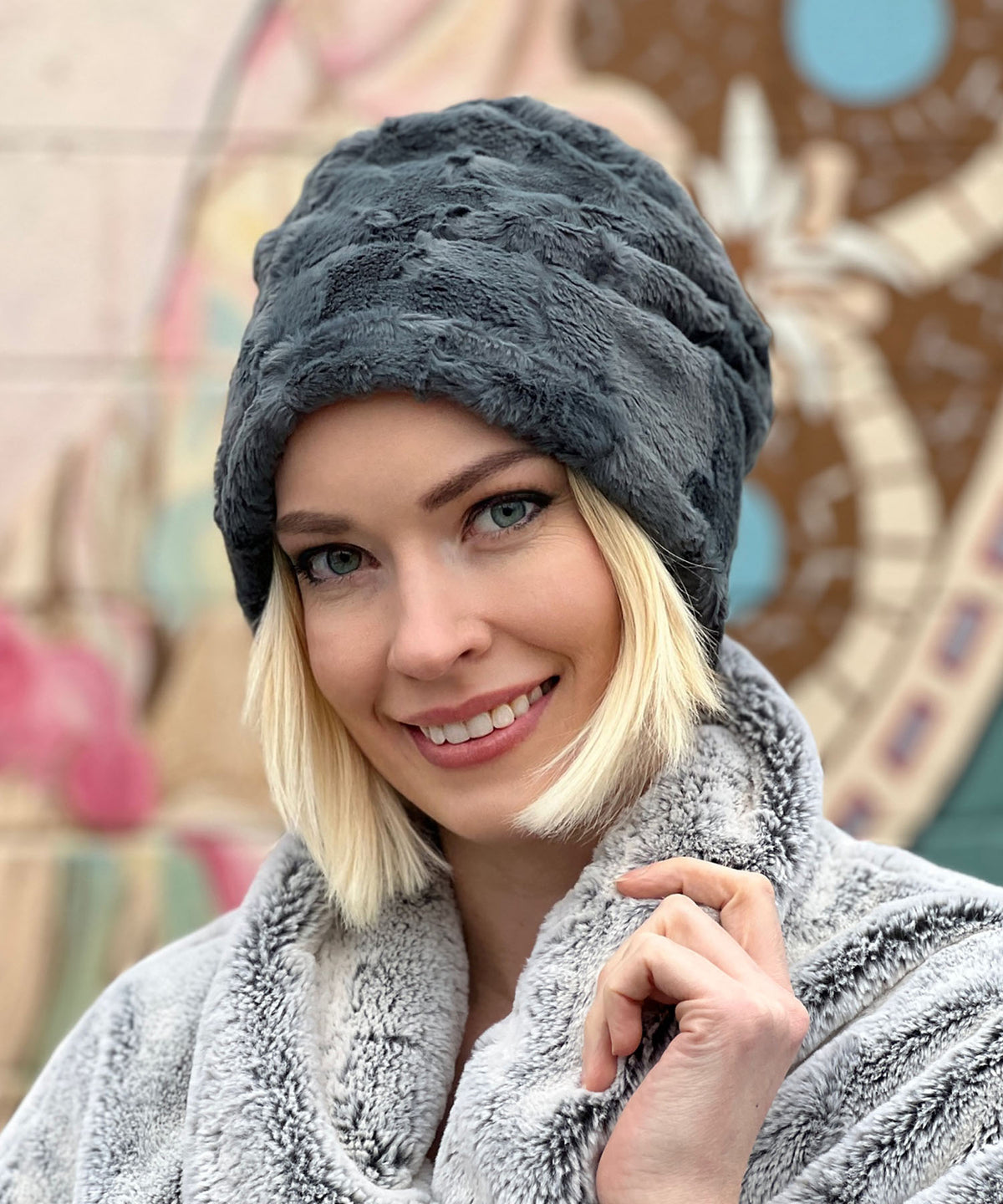 Model wearing Cuffed Pillbox in blue slate faux fur by Pandemonium Millinery handmade in Seattle WA