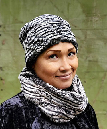 Modeling is wearing Neck Warmer and Cuffed Pillbox | 8mm Black and White Faux Fur | Handmade in the USA by Pandemonium Seattle