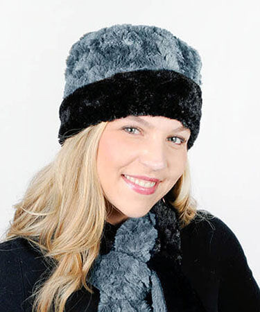 Model wearing Cuffed Pillbox in  Cuddly Stone and Black Faux Fur by Pandemonium Millinery. Handmade in Seattle, WA USA.