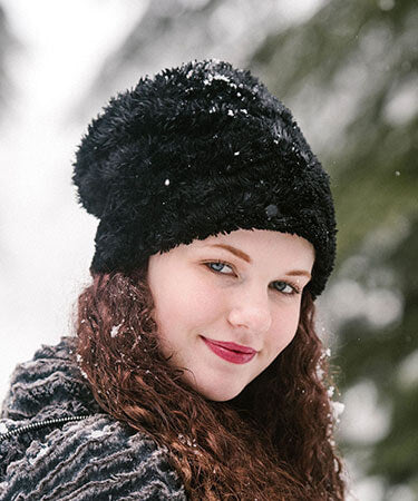 Model in Cuffed Pillbox Cuddy Faux Fur in Black handmade in Seattle, WA by Pandemonium Millinery