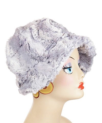 Grace Cloche hat shown in Luxury Faux Fur in Winter River with  Rouge pink satin sash with Feather medallion Pink and Teal Brooch by Pandemonium Seattle. Handmade in Seattle WA USA.