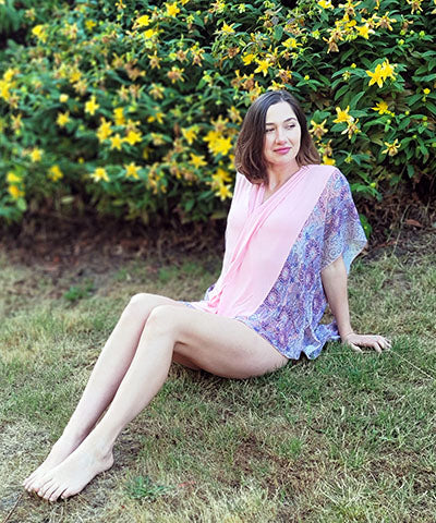 Woman modeling side view of Kaftan in Paisley Madness and Pink Planet