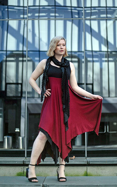 Woman wearing Reversed Handkerchief Cut Lilium Dress in Abyss Black with Blood Moon Red Jersey Knit handmade in Seattle WA from Pandemonium Millinery USA