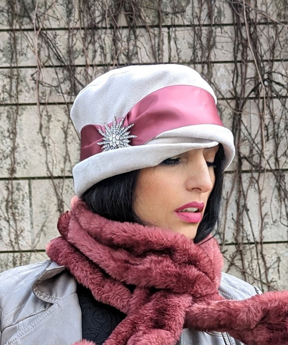 Model wearing Lola Hat in Silver Faux Suede with Rouge Pink Satin Band and Sunburst Rhinestone Brooch and Scarf in Maple Glow Faux Fur | Handmade by Pandemonium Seattle