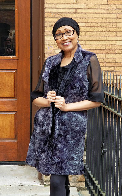 Woman posing in Mandarin Vest Long | Highland in Sky Denim and Gray Faux Fur with Cuddly Black Faux Fur | By Pandemonium Millinery | Handmade in Seattle WA USA