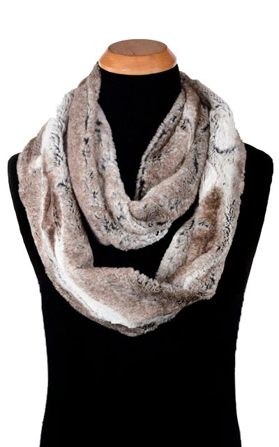 Men’s Product shot of Infinity Scarf on mannequin | Birch Faux Fur, Brown and Ivory | Handmade in Seattle WA Pandemonium MillineryProduct shot of Women’s Infinity Loop Scarf | Birch a brown and cream Faux Fur | Handmade in Seattle WA | Pandemonium Millinery