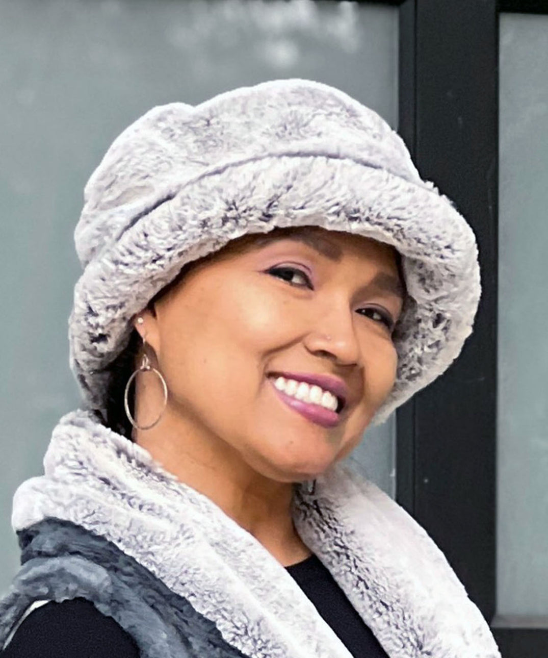 Right side View of Model wearing Molly Bucket Style hat in Frosted Juniper by Pandemonium Seattle.  Handmade in Seattle, WA  USA.