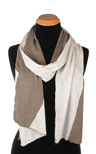 Display of the Upcycled Motley Scarf in two colors, Sandstone and Mezcal. Handmade in Seattle, WA by Pandemonium Seattle.