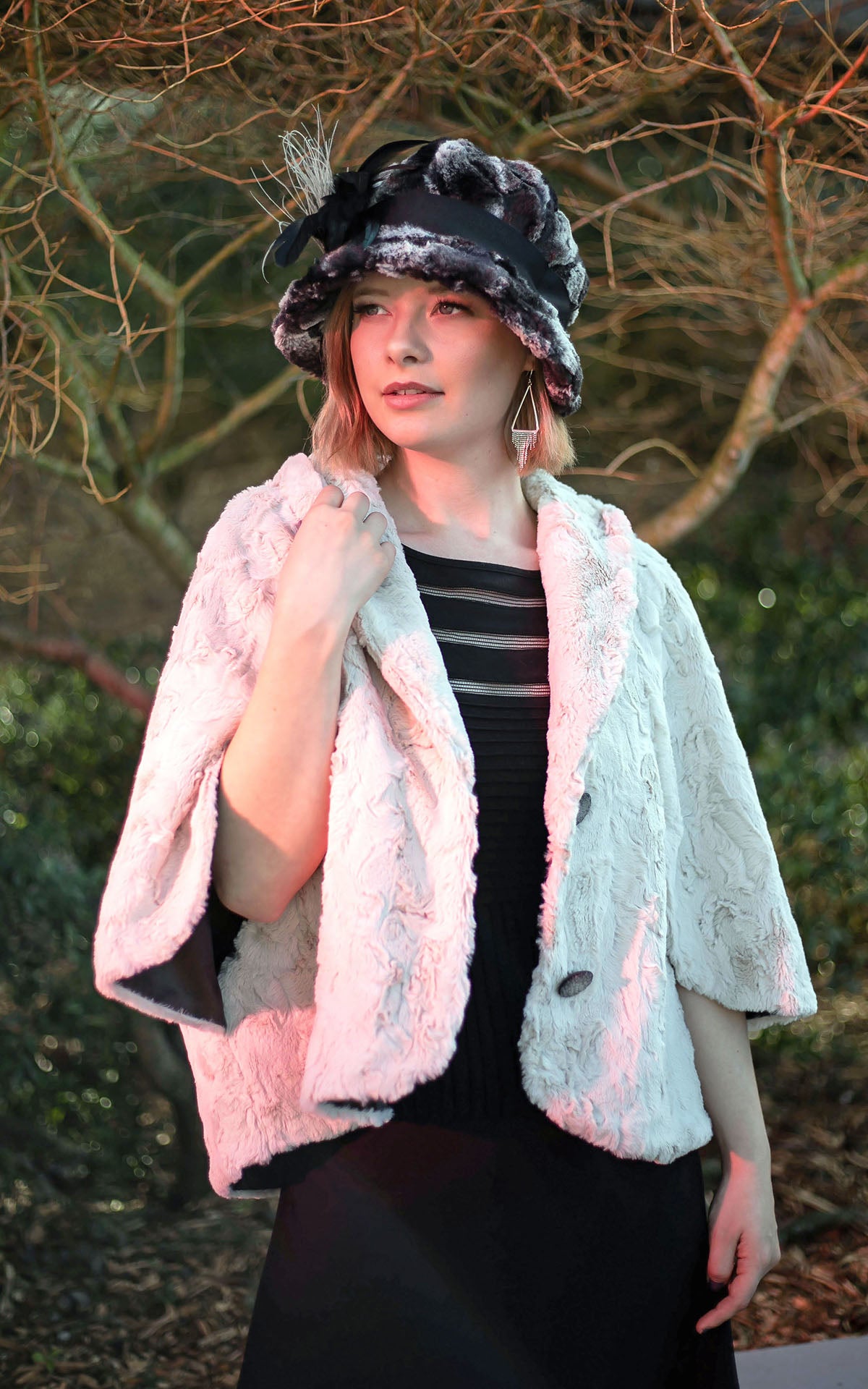Model wearing a Grace Cloche hat shown in Opera Cape in Cuddly Faux Fur in Sand | By Pandemonium Millinery | Handmade in Seattle WA