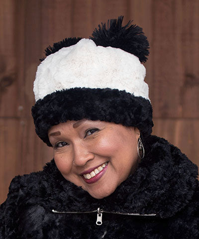 Woman modeling Panda Bear Beanie Hat with ears, in Cuddly Ivory Faux Fur lined with Black. Handmade by Pandemonium Millinery.