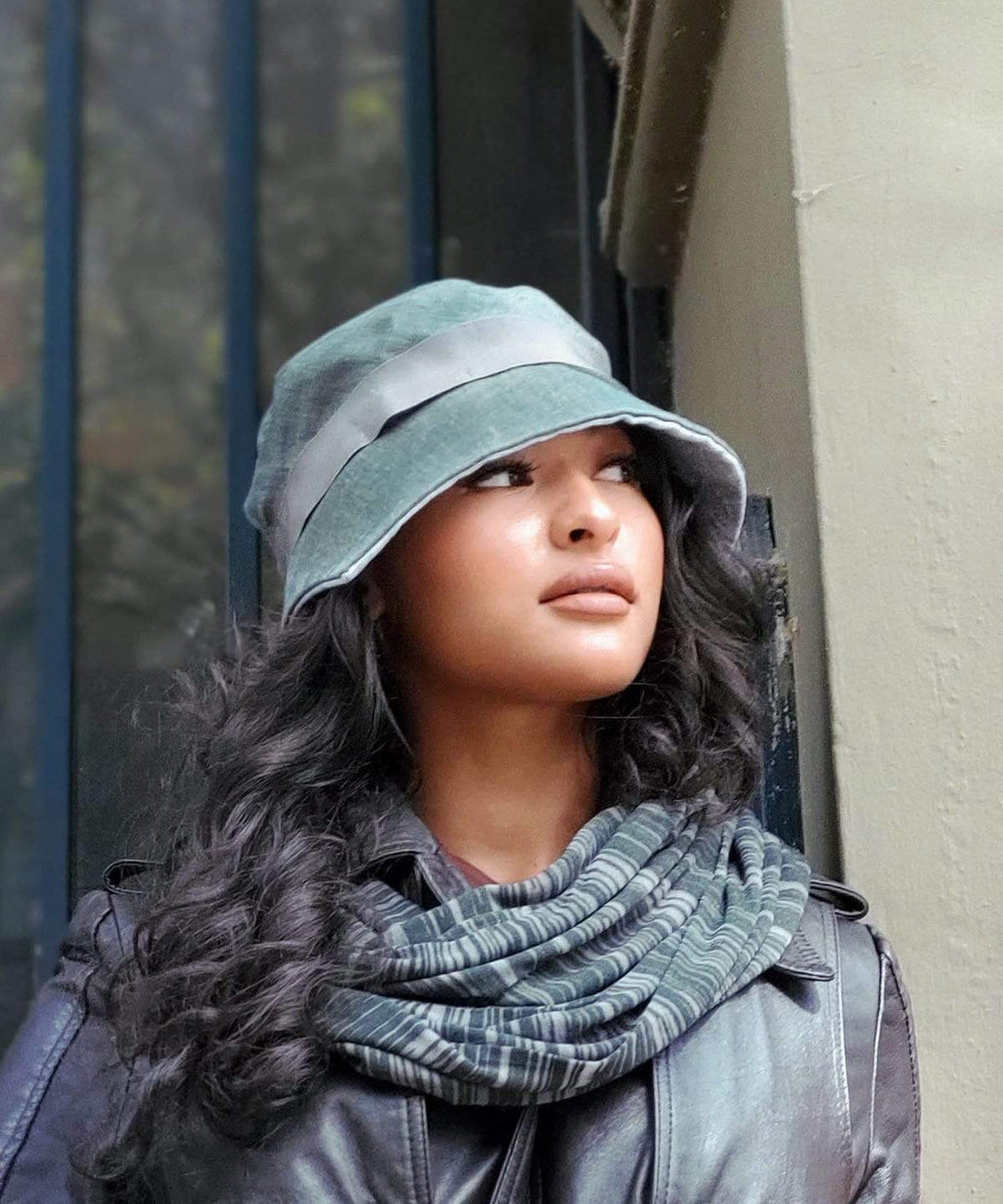 Woman wearing Abigail Hat in Juniper Silver-Green Linen with Silver under brim with Silver Band. Handmade in Seattle WA| Pandemonium Millinery