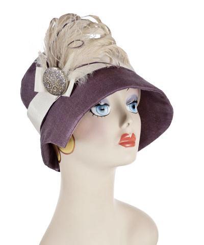 Abigail Hat in Plum Lilac Linen with Grosgrain Cream Band. Trimmed with Cream Feather and Button. Handmade in Seattle WA| Pandemonium Millinery