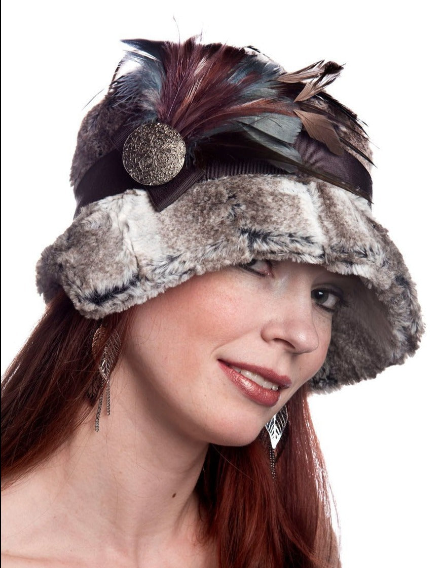 Woman wearing Abigail Hat in Luxury Birch Faux Fur with Brown Grosgrain Band and Feathers| Handmade in Seattle WA| Pandemonium Millinery 