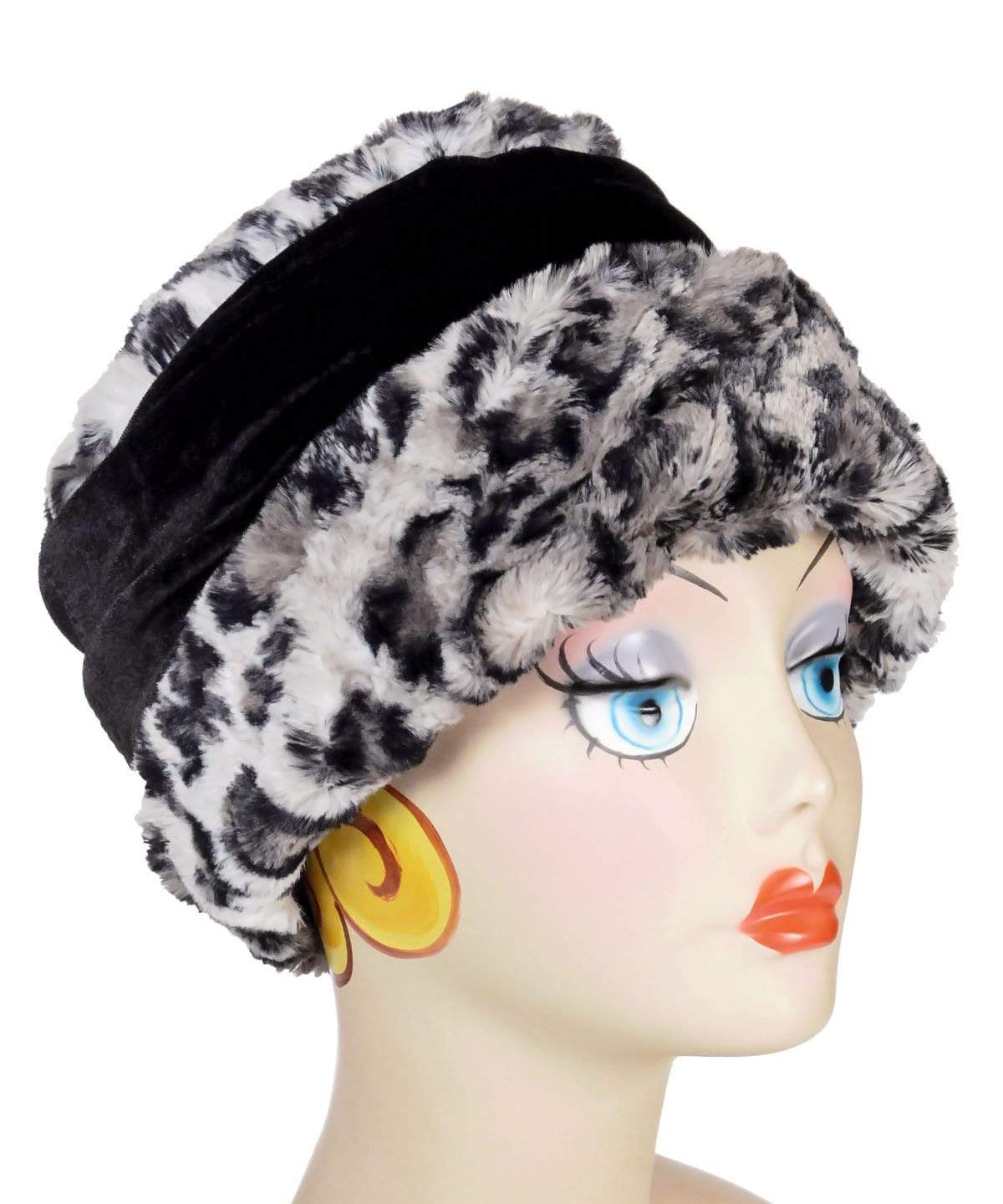 Side view of Ana Cloche Hat in Savannah Cat Luxury Faux Fur with Black Velvet Band | Shown with Black and Red Rhinestone Feather Brooch | Handmade in Seattle WA | Pandemonium Millinery