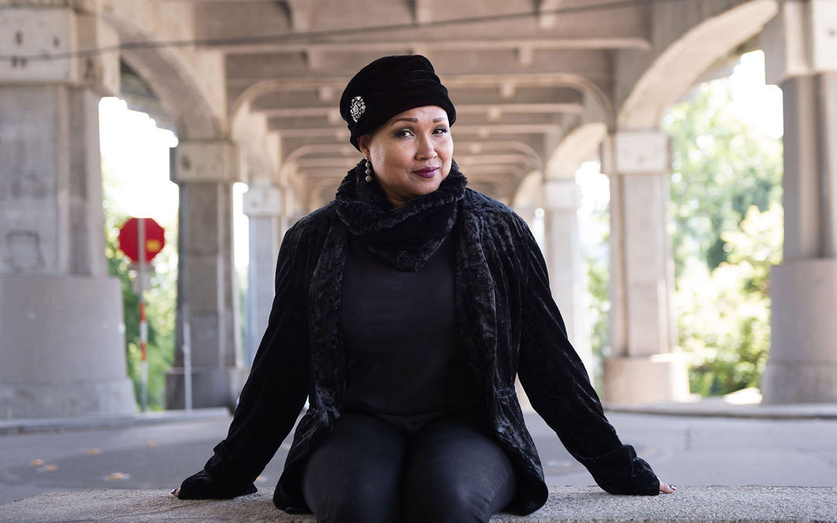 Woman wearing Ana Cloche Hat in Black Velvet with Rhinestone Brooch| Handmade in Seattle WA| Pandemonium Millinery