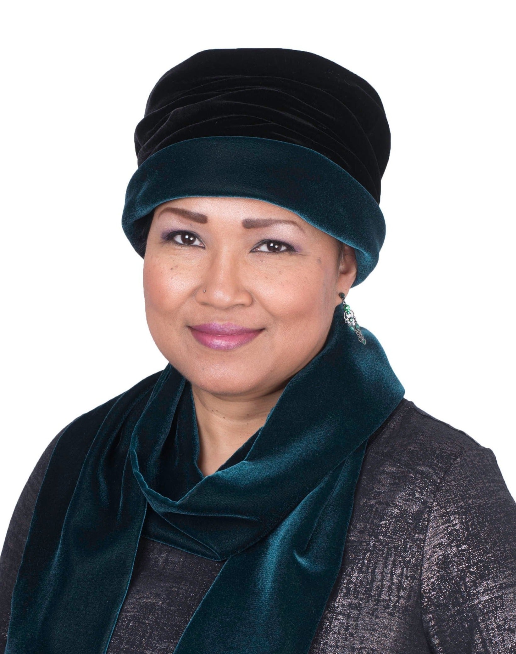Woman wearing Ana Cloche Hat in Emerald Velvet and Black Velvet Band and matching Emerald scarf| Handmade in Seattle WA| Pandemonium Millinery