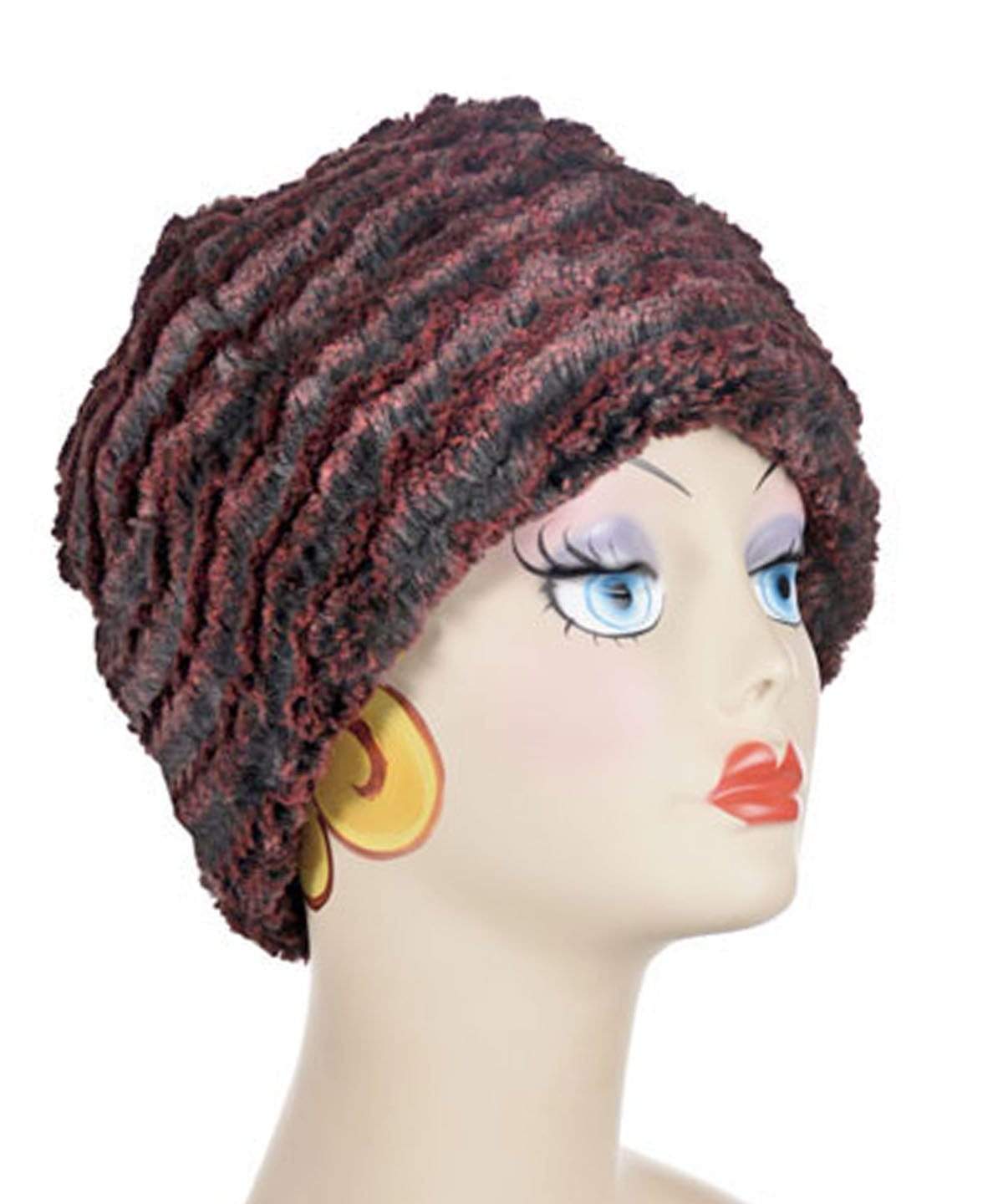 Beanie Hat reversible in Crimson Desert Sand and Cuddly Black Faux Fur, shown uncuffed. Handmade by Pandemonium Millinery in Seattle, WA.