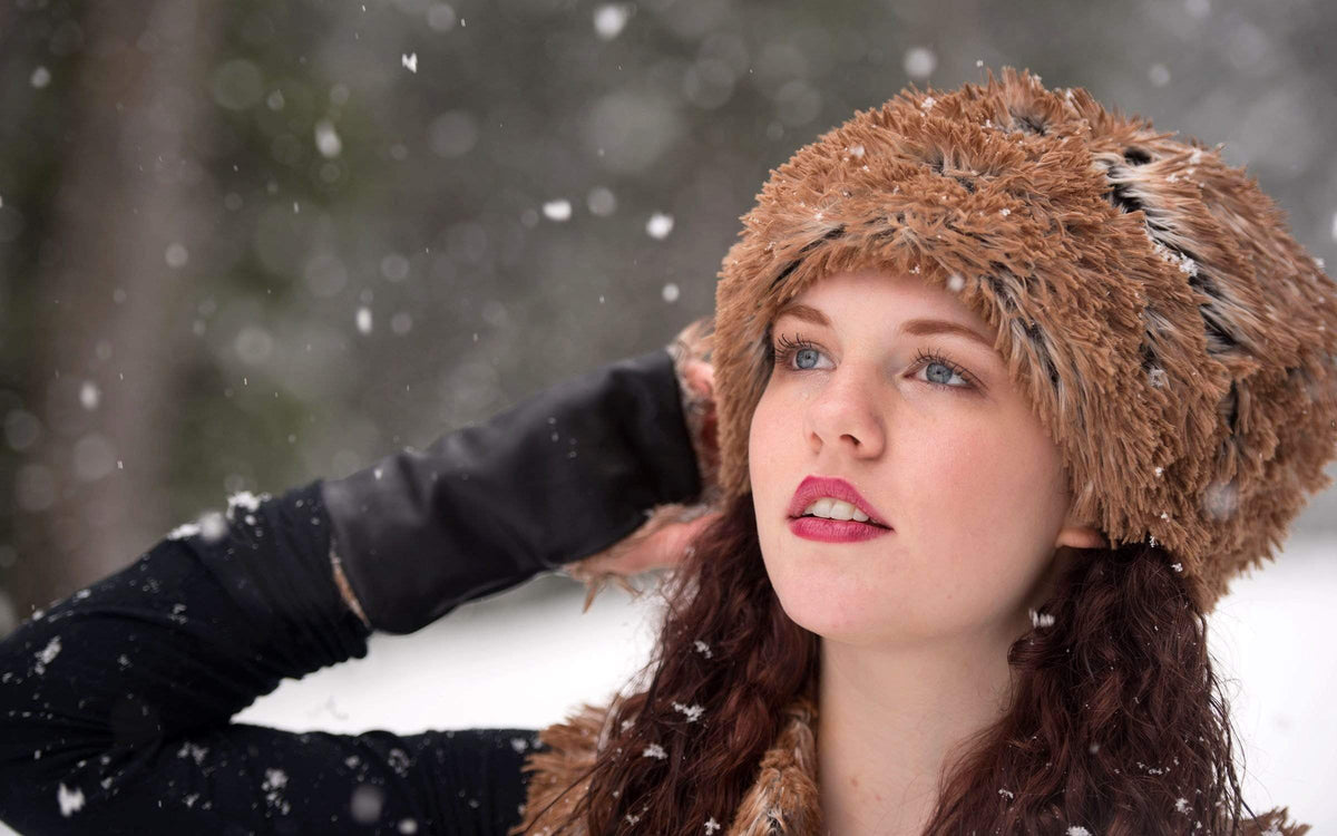 Woman modeling Beanie Hat reversible in Red Fox and Cuddly Black Faux Fur. Handmade by Pandemonium Millinery in Seattle, WA.