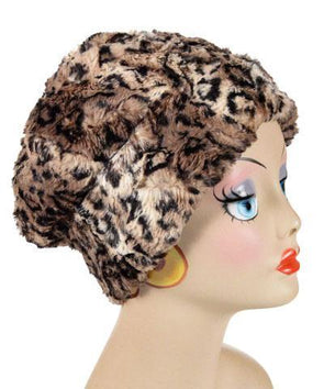 Beanie Hat reversible in Carpathian Lynx and Cuddly Black Faux Fur, shown uncuffed. Handmade by Pandemonium Millinery in Seattle, WA.