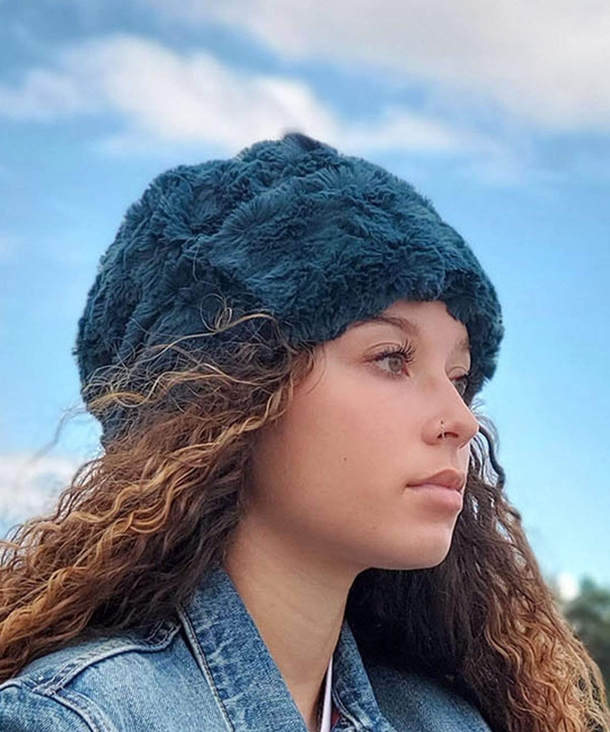 Woman modeling Beanie Hat, reversible - Luxury Faux Fur in Peacock Pond lined in Cuddly Black. By Pandemonium Millinery