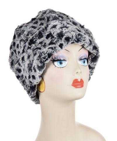 Side view of Beanie Hat, reversible - Luxury Faux Fur in Snow Owl lined in Cuddly Black. By Pandemonium Millinery