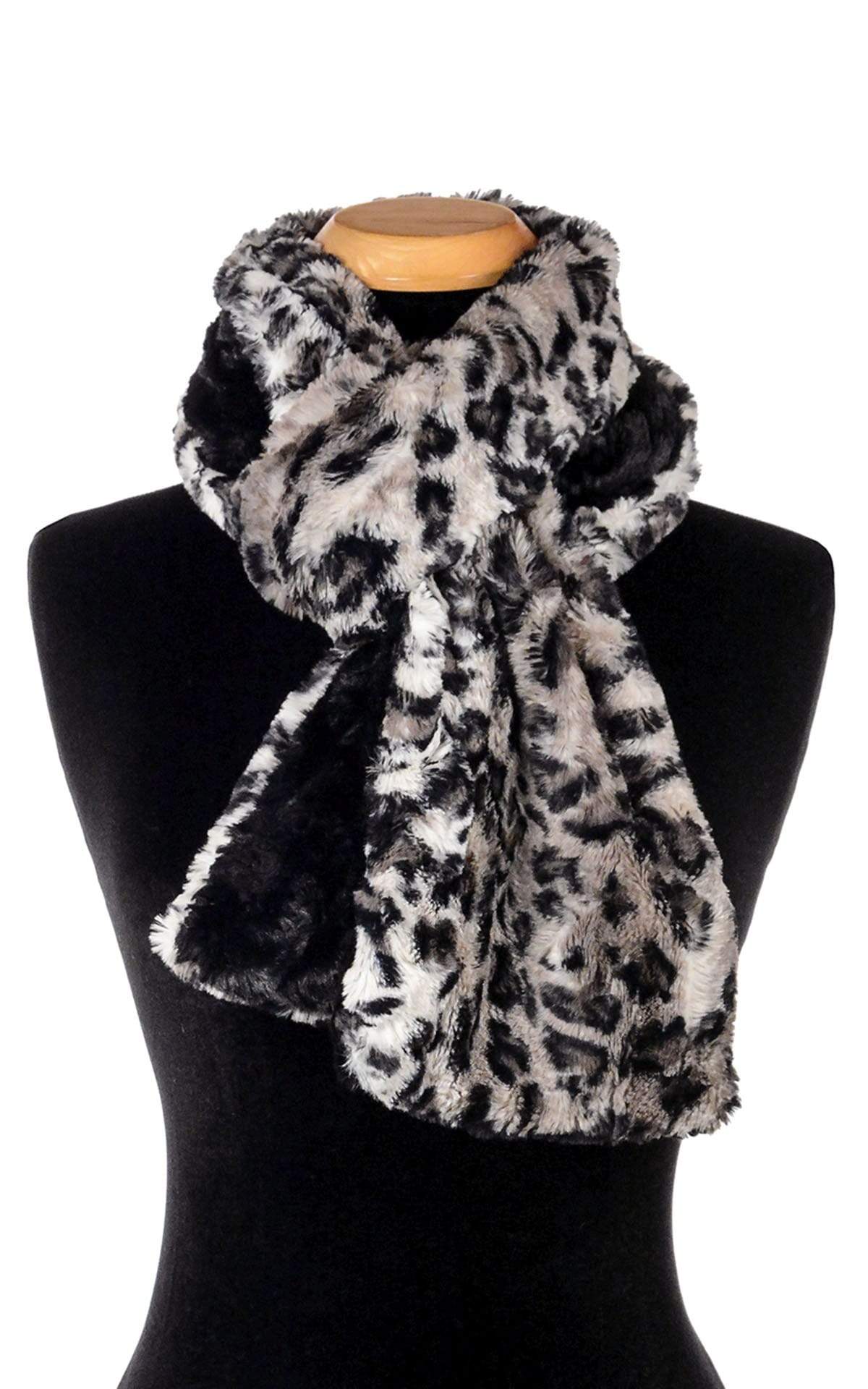 Women’s Product shot on mannequin of Two-tone Classic Scarf | Savannah Cat animal print Faux Fur with cuddly black | Handmade by Pandemonium Millinery Seattle, WA USAof Classic Skinny Scarf | Savannah Cat animal print Faux Fur | Handmade by Pandemonium Millinery Seattle, WA USA