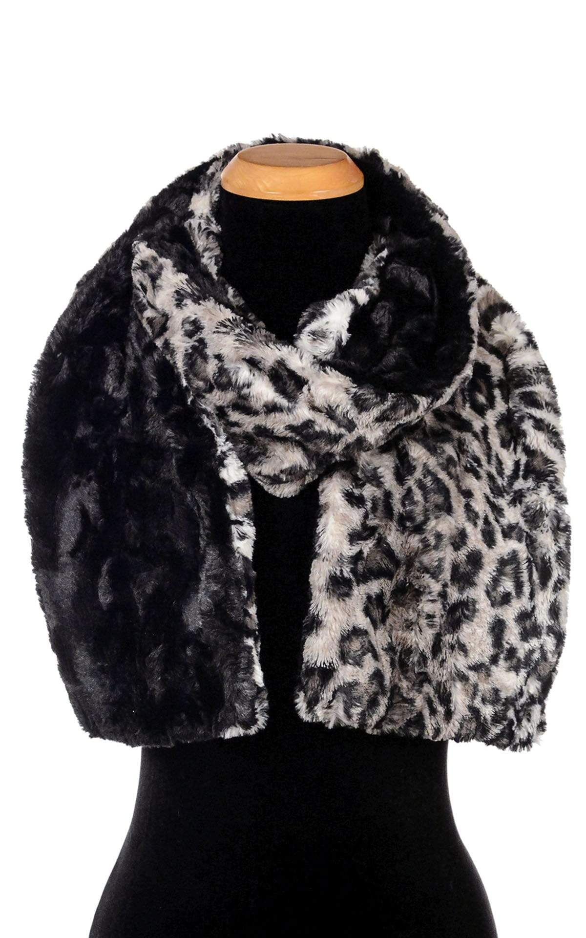 Women’s Product shot on mannequin of Two-tone Classic Scarf | Savannah Cat animal print Faux Fur with cuddly black | Handmade by Pandemonium Millinery Seattle, WA USAof Classic Skinny Scarf | Savannah Cat animal print Faux Fur | Handmade by Pandemonium Millinery Seattle, WA USA