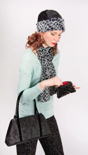 Model In Pebbles in Black Beanie looking into a Coin Purse in Cuddly Black Faux Fur | Handmade in Seattle WA USA | By Pandemonium Milliner
