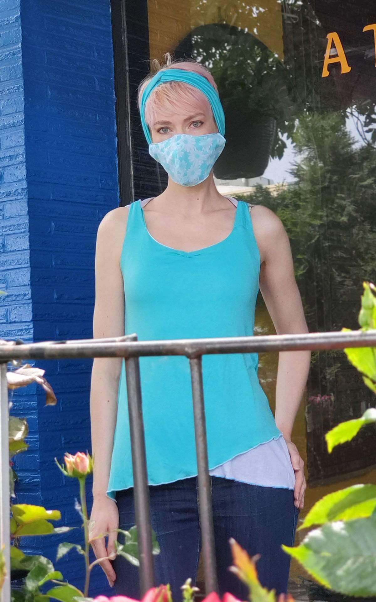 Model wearing the Tulip Top a reversible sweet-heart style top | Oceans of emptiness with milky way light Jersey Knit, aqua blue and white | Handmade in Seattle WA | Pandemonium Millinery