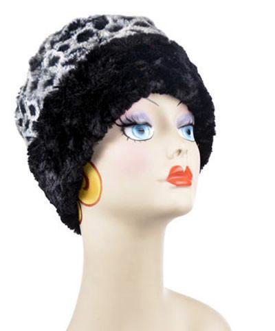 model wearing a Cuffed Pillbox hat style in Luxury Faux Fur  Snow Owl by Pandemonium Millinery made in Seattle Wa
