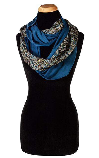 Women’s two-tone infinity Scarf, Wrap on Mannequin wrapped around twice | Peacock Paisley Chiffon in blue, greens, and browns | Handmade in Seattle WA | Pandemonium Millinery
