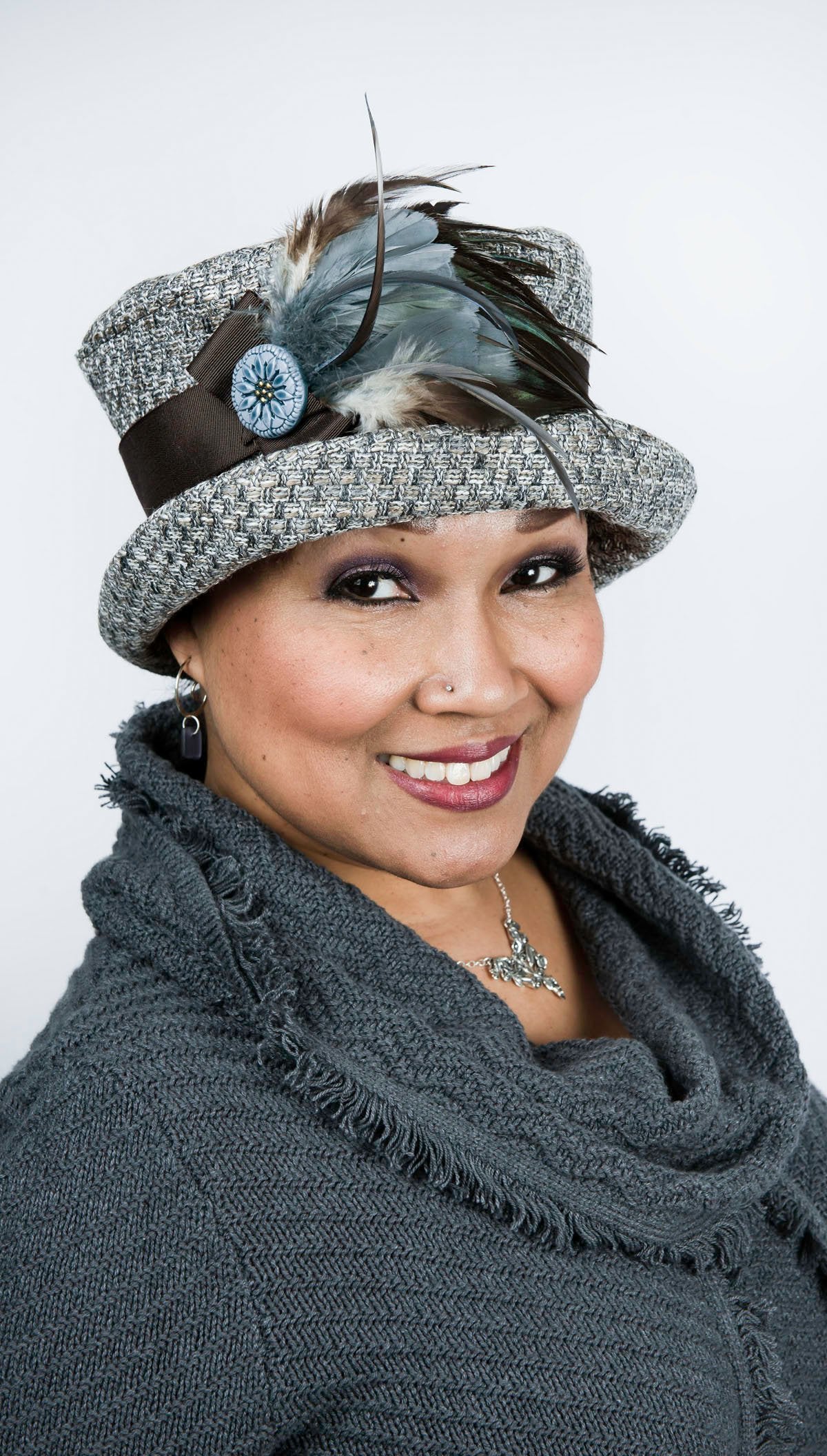 Feather Brooch with Hand Painted Button Detail on Bucket Hat | Steel, Natural, and Black Feathers with Brown Grosgrain | handmade in Seattle WA by Pandemonium Millinery USA