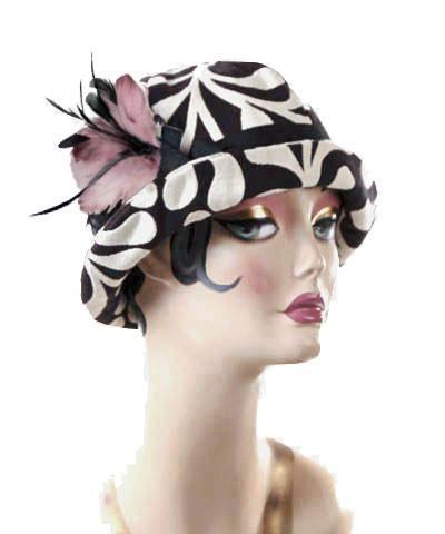  Grace Cloche Style Hat in Black Pepper Paisley Upholstery Fabric featuring Black and Mauve  Feather Brooch and Black Grosgrain Band| Pandemonium Millinery | Seattle WA USA