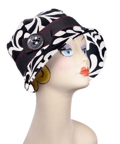  Grace Cloche Style Hat in  Black Pepper Paisley Upholstery Fabric with Black and Burgundy Band  and Bow with sewn on Button trim | Pandemonium Millinery | Seattle WA USA