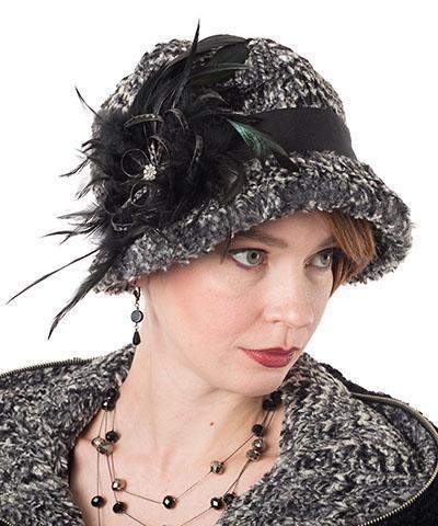 Sideview of a Model wearing a Grace Cloche Hat in  Cozy Cable in Ash Faux Fur with Black Feather Brooch | Handmade By Pandemonium Millinery | Seattle WA USA