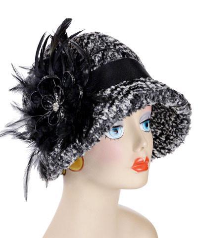 Sideview of a Model wearing a Grace Cloche Hat in  Cozy Cable in Ash Faux Fur with Black Feather Brooch | Handmade By Pandemonium Millinery | Seattle WA USA