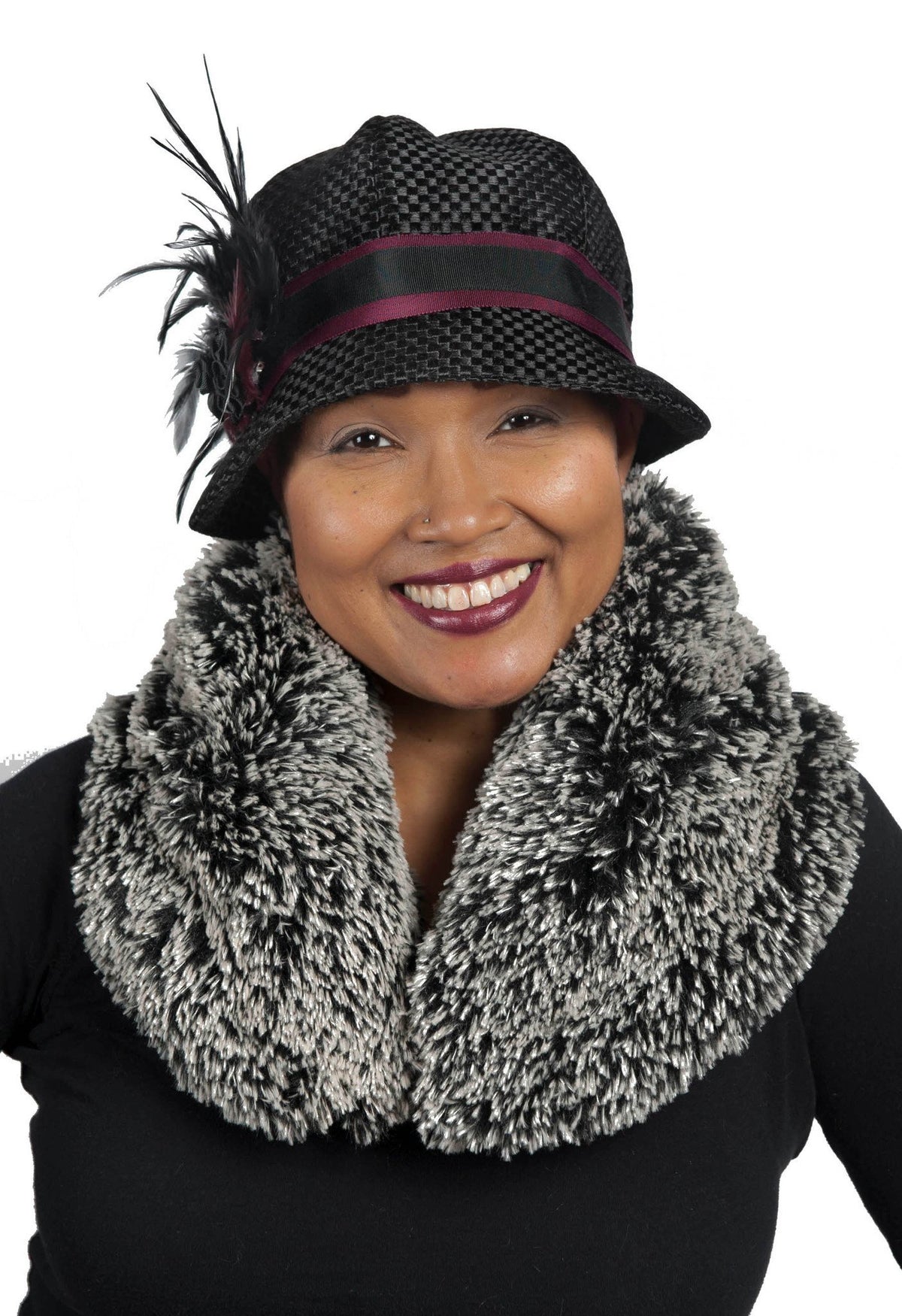 Model wearing Grace Cloche Interconnected in Black with Black and Burgundy Band Featuring Black Feather Brooch | Silver Tip Fox in Black Faux Fur Collar featured | Hand made By Pandemonium Millinery | Seattle WA USA
