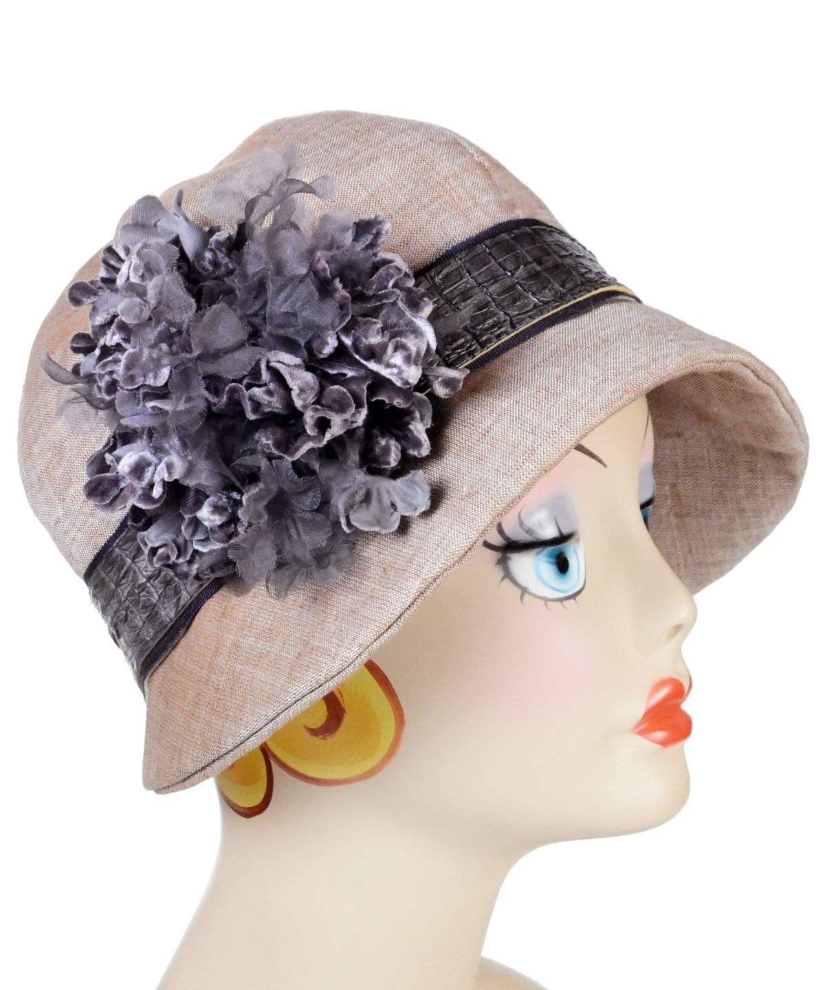 Model wearing Grace Cloche Linen in Coral  with  Faux Croc Band and Custom Purple Multi Flower Brooch | Handmade By Pandemonium Seattle | Seattle WA USA