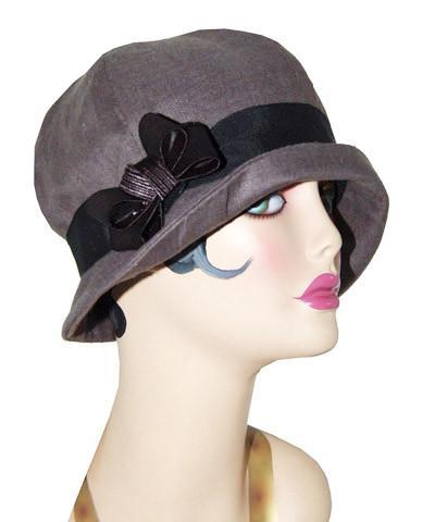 Woman wearing Grace Cloche Linen in Gray with Black Grosgrain Band and Black Bow| Handmade By Pandemonium Millinery | Seattle WA