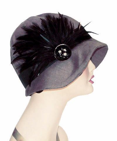 Woman wearing Grace Cloche Linen in Gray with Black Grosgrain Band and  Black Fan Style Feathers with Beaded Button Brooch| Handmade By Pandemonium Millinery | Seattle WA