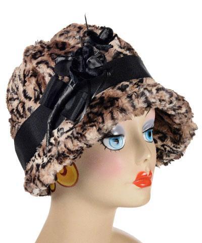 Product Shot of Grace Cloche 1920s Style Hat in Carpathian Lynx animal print Faux Fur with Black Grosgrain Band  and Black Velvet Roses Brooch | By Pandemonium Millinery | Seattle WA USA