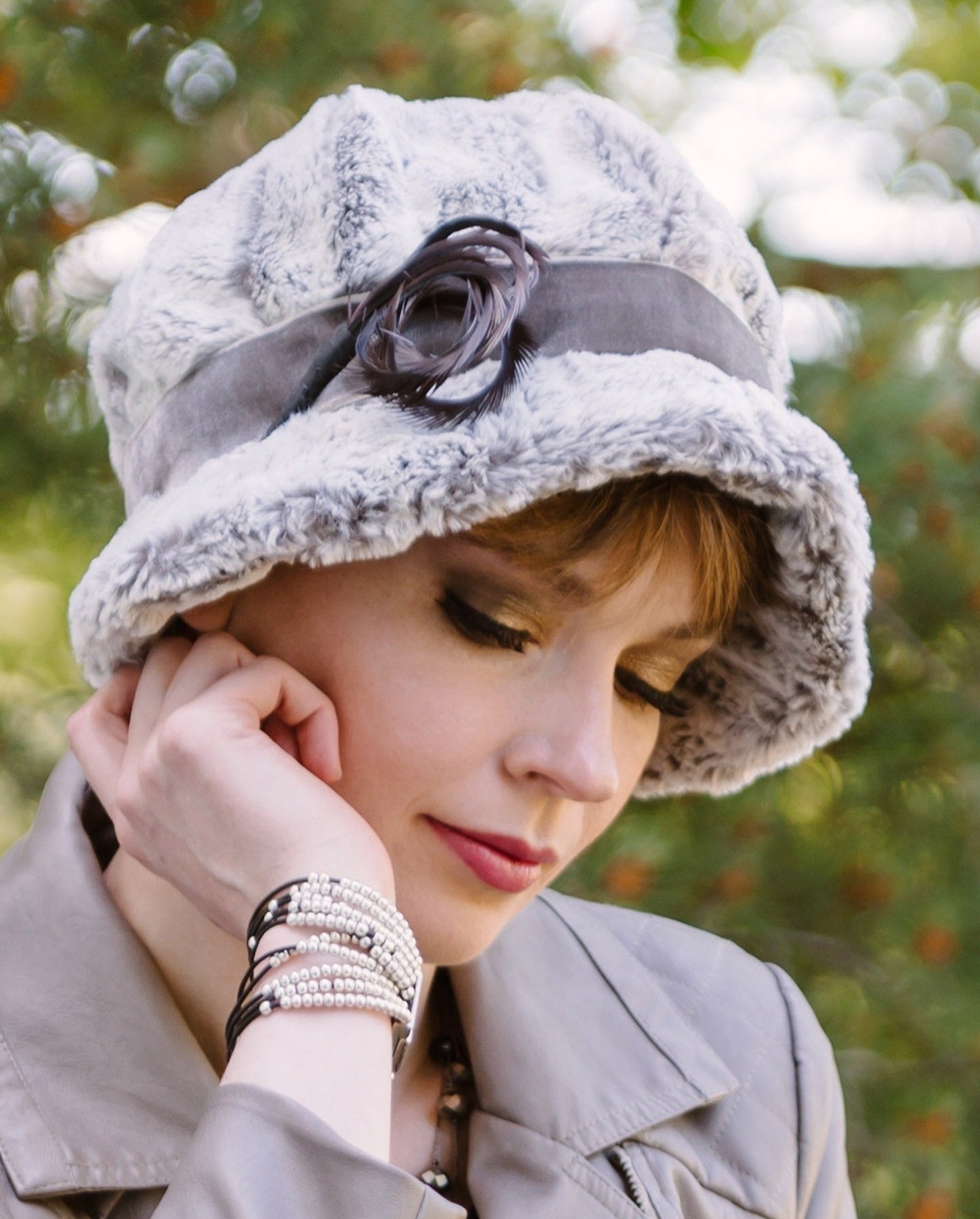 Grace Hat in Khaki Faux Fur shown on Model features Midori Velvet Band with Curl Gray Feather | By Pandemonium Millinery | Seattle WA USA
