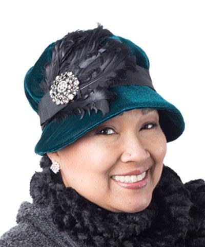  Model wearing Grace 1920s Cloche Style Hat Velvet Emerald with  Large Black Feather Fan with  Rhinestone Brooch  | By Pandemonium Millinery | Seattle WA USA