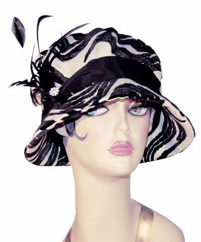 Grace Cloche in Wave Upholstery Fabric with Feather  and Rhinestone Brooch  | Handmade By Pandemonium Millinery | Seattle WA USA