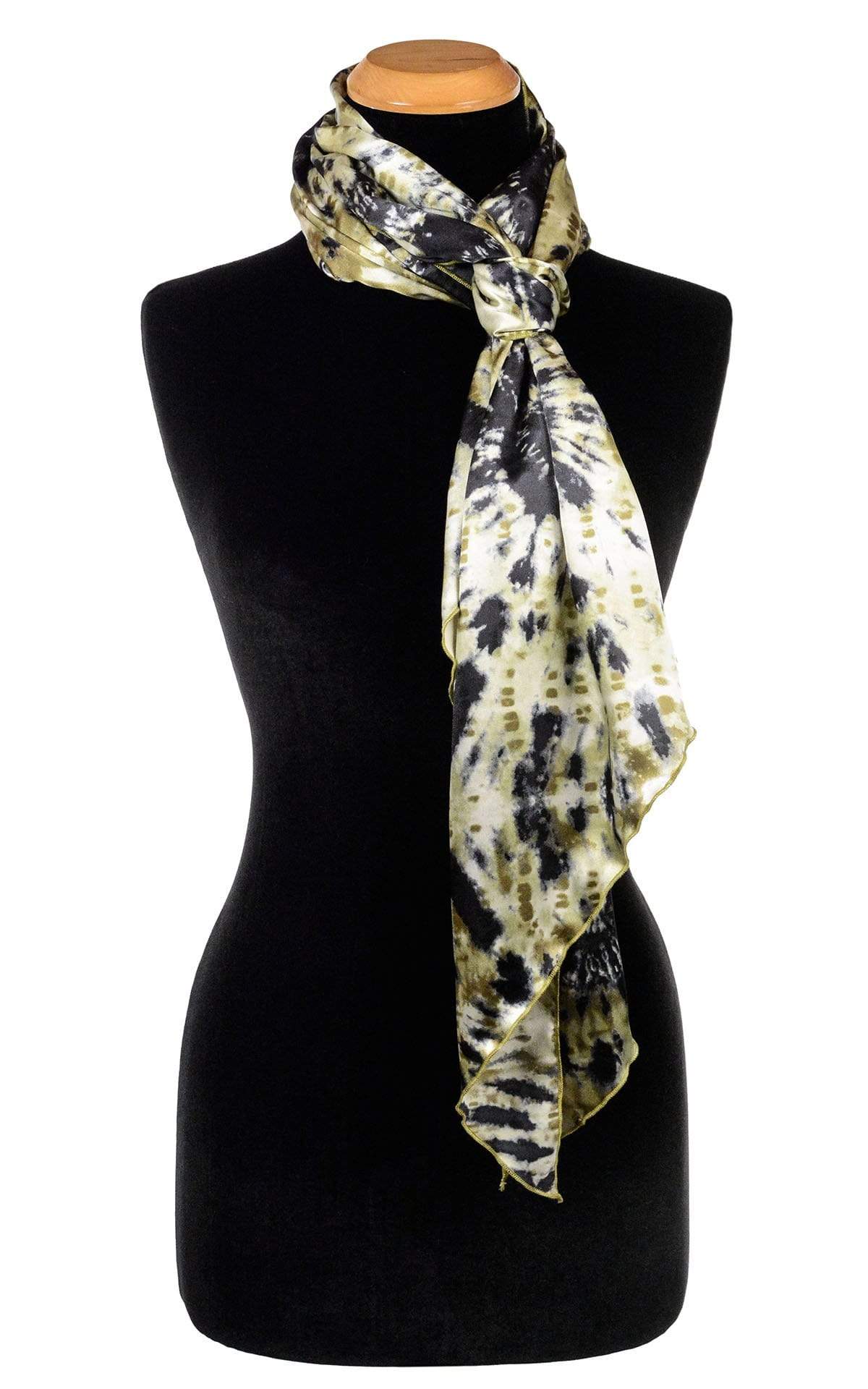 Women’s  Large Handkerchief Scarf, Wrap on Mannequin wrapped tied in front | Egyptian Oasis, Black, Greens, and ivory tie-dye | Handmade in Seattle WA | Pandemonium Millinery