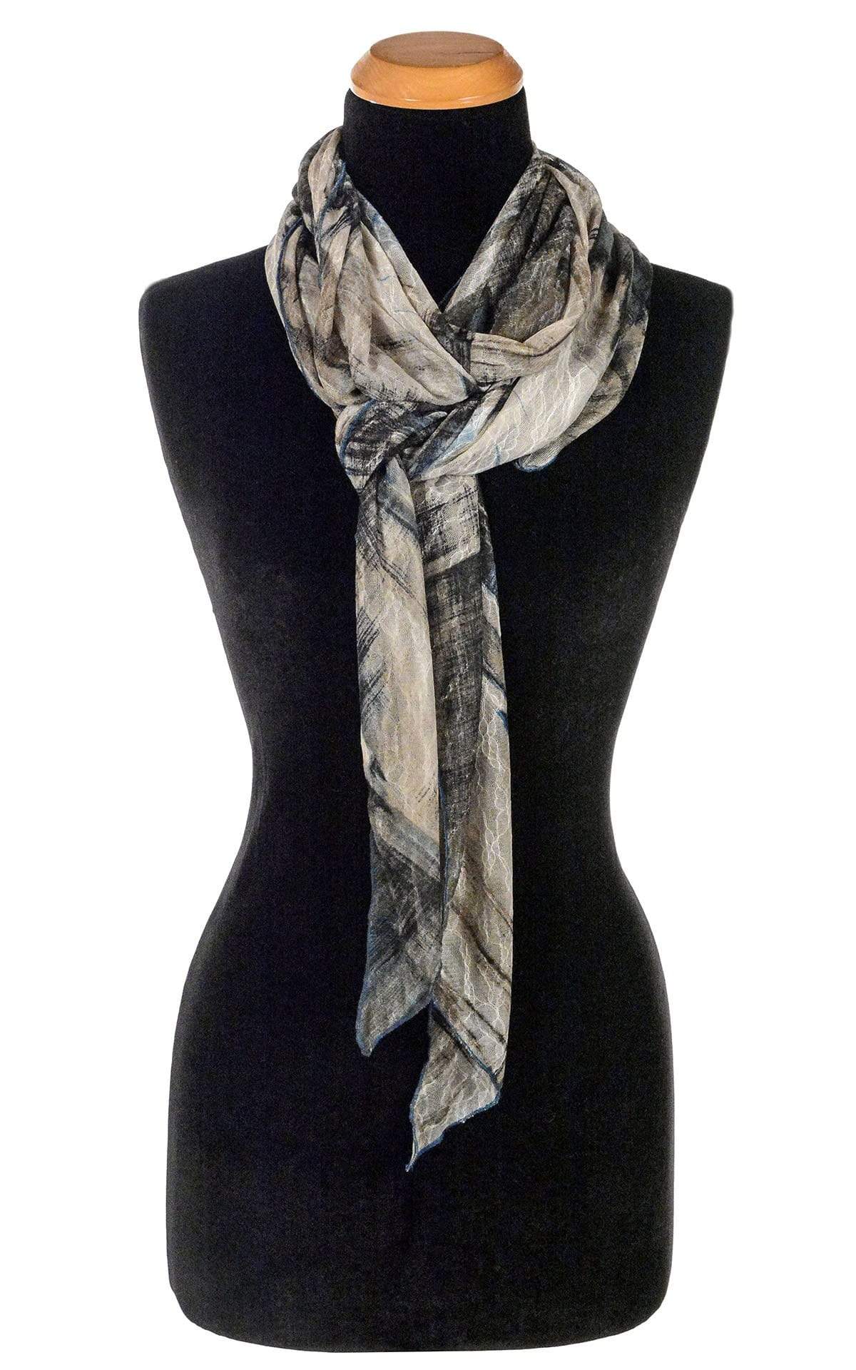 Women’s Large Handkerchief Scarf, Wrap on Mannequin shown tied | Lovely Lace in Blue, a blue/beige/black print on sheer lace knit | Handmade in Seattle WA | Pandemonium Millinery