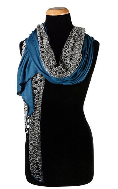 Ladies Two-Tone Handkerchief Scarf on Mannequin | Lunar Landing, a black and neutral knit with curled edges surrounding holes, paired with a light-weight blue Jersey Knit | Handmade in Seattle WA | Pandemonium Millinery