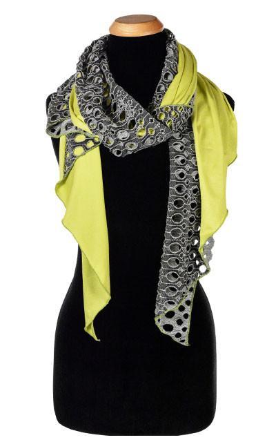 Ladies Two-Tone Handkerchief Scarf on Mannequin | Lunar Landing, a black and neutral knit with curled edges surrounding holes, paired with a light-weight lime Green Jersey Knit | Handmade in Seattle WA | Pandemonium Millinery