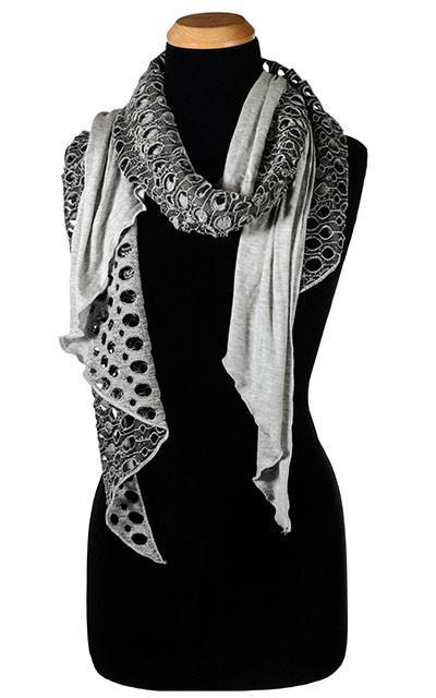 Ladies Two-Tone Handkerchief Scarf on Mannequin | Lunar Landing, a black and neutral knit with curled edges surrounding holes, paired with a light-weight Silver Gray Jersey Knit | Handmade in Seattle WA | Pandemonium Millinery
